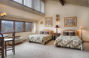 En eller flere senge i et værelse på Tamarron Gambel Oak 796 + 68 billeder