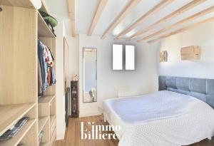 Posteľ alebo postele v izbe v ubytovaní Appartement architecte proche plage