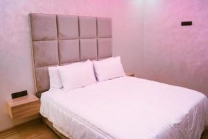 Ένα ή περισσότερα κρεβάτια σε δωμάτιο στο Luxurious apartment
