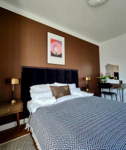 Ένα ή περισσότερα κρεβάτια σε δωμάτιο στο Apartament N7 Centrum