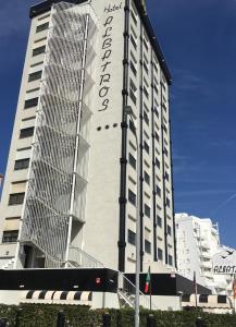 a tall building with the word hotel on it at Hotel Albatros in Gandía