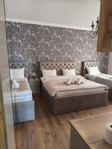 Postel nebo postele na pokoji v ubytování Lake House