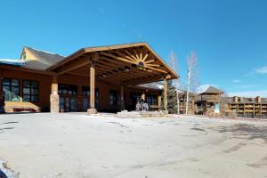 a large building with a wooden roof at Silver Lodge A in Granby