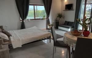 Postel nebo postele na pokoji v ubytování Villa Oliva Torotto + 9 fotografií