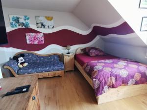 Postel nebo postele na pokoji v ubytování FeWo-AdOlTi