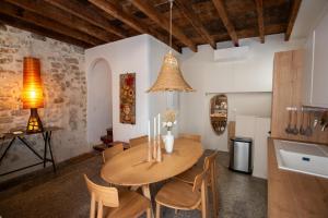 Kuchyň nebo kuchyňský kout v ubytování Donjon - Clim - Terrasse - Premium + 26 fotografií