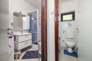 Kúpeľňa v ubytovaní Apartment Tus A2