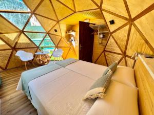a bedroom in a yurt with a bed in it at Igloo Rooms - Belorado in Belorado +37 photos