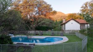 Bazén v ubytování Algarrobo Luz Cabañas nebo v jeho okolí
