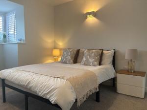 Ένα ή περισσότερα κρεβάτια σε δωμάτιο στο Secluded Coventry Escape