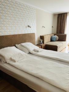 Postel nebo postele na pokoji v ubytování Thermal Garden Weninger Apartmanok