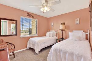 Ένα ή περισσότερα κρεβάτια σε δωμάτιο στο Lighthouse Point Rental 21B +40 φωτογραφίες