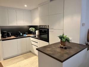 Kép Turquesa Apartment,Punta Prima ,2 bed, 4 swimming pools and cabriolet Peugeot 307 included szállásáról Torreviejában a galériában