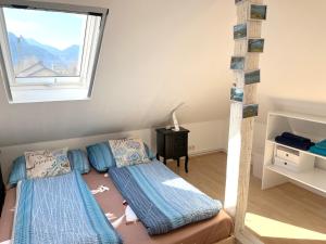 Posteľ alebo postele v izbe v ubytovaní Ferienwohnung Attersee