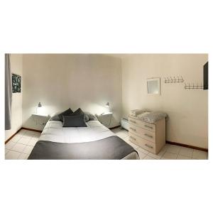 En eller flere senge i et værelse på Departamento MITRE PB