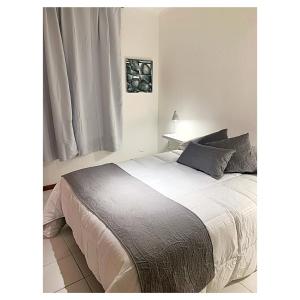 En eller flere senge i et værelse på Departamento MITRE PB