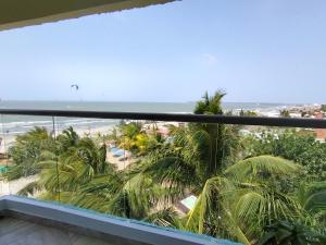 a view of the beach from a balcony at Avadia del Mar in Cartagena de Indias