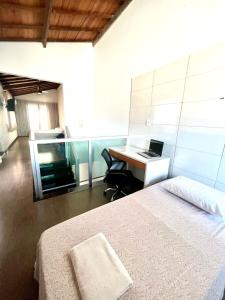 Fotografie z fotogalerie ubytování Hospedagem Studio Privativo em Dois Pavimentos Perfeito para Famílias ou Grupos v destinaci Ipatinga