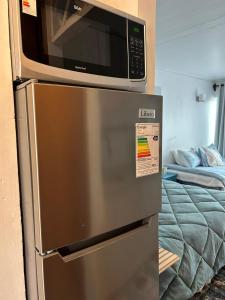 Ένα ή περισσότερα κρεβάτια σε δωμάτιο στο Reñaca Beach Studio