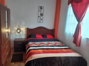 Postel nebo postele na pokoji v ubytování SANPE Apartment