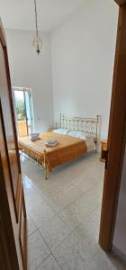 a bedroom with a bed in a room at Tiber Domus Trevignano in Trevignano Romano