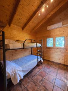 Postel nebo postele na pokoji v ubytování Nuevo Ecolodge Cabañeros
