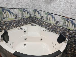 ห้องน้ำของ Hotel Montaña White villasol