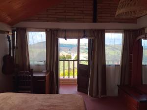 Voodi või voodid majutusasutuse Cabaña Hermosa vista cerca a Tunja Villa Cristal Campestre toas