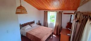 Voodi või voodid majutusasutuse Cabaña Hermosa vista cerca a Tunja Villa Cristal Campestre toas