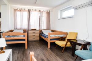 Una cama o camas en una habitación de Voćnjak