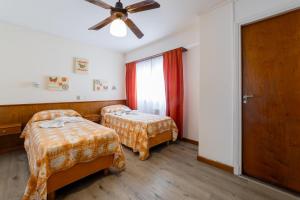 Postel nebo postele na pokoji v ubytování Hotel España