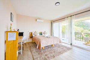 Voodi või voodid majutusasutuse Nosara Hideaway 3 - BREAKFAST INCLUDED & Mountain View Cabins toas
