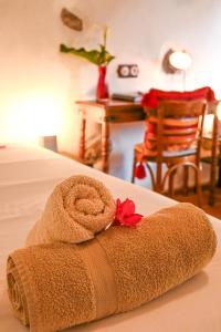 A bed or beds in a room at Casa Rural Chamorga - Pensión - Guesthouse -
