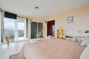 Voodi või voodid majutusasutuse Nosara Hideaway 3 - BREAKFAST INCLUDED & Mountain View Cabins toas