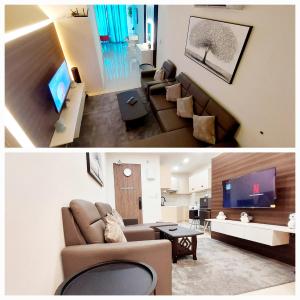 a living room with a couch and a tv at Golden Kinabalu in Kota Kinabalu
