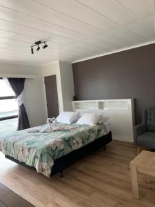 Postel nebo postele na pokoji v ubytování Wayfarer Motel + 20 fotografií