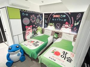 Katil atau katil-katil dalam bilik di Henn na Hotel Osaka Shinsaibashi