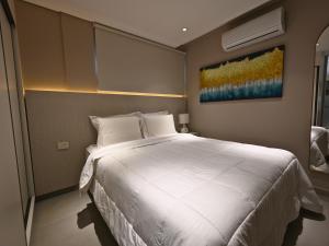 Llit o llits en una habitació de ABIBA Apart-Hotel & SPA
