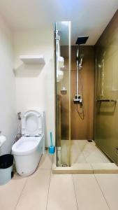 Ένα μπάνιο στο Walking Street Unixx condo Beautiful sea view