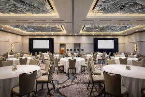 a conference room with white tables and chairs at The Westin Austin Downtown in Austin +94 photos