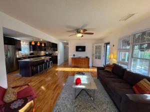 a living room with a couch and a table at Travel Often House in Kennesaw