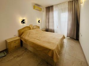 A bed or beds in a room at Sea View Rental Front Beach