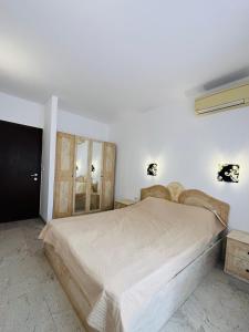 A bed or beds in a room at Sea View Rental Front Beach