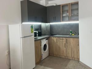 A kitchen or kitchenette at Sea View Rental Front Beach