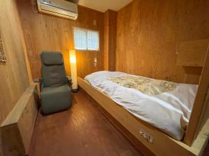 Katil atau katil-katil dalam bilik di Guesthouse Otaru Wanokaze