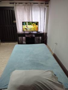 Postel nebo postele na pokoji v ubytování Apartaestudio Ideal para 1 Persona, El Lago, Andina, SENA