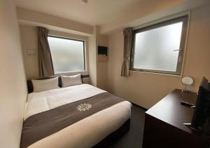 Postel nebo postele na pokoji v ubytování Floral Hotel · SakaisuJi-Honmachi Osaka + 37 fotografií
