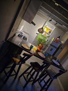 Kuchyň nebo kuchyňský kout v ubytování Urban Hostal Barrancabermeja