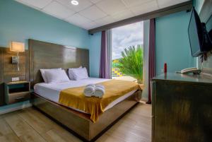 Postel nebo postele na pokoji v ubytování Airport Suites Hotel + 37 fotografií