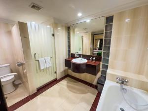 Koupelna v ubytování Champlung Mas Hotel Legian